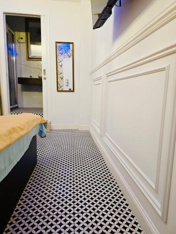 Postel nebo postele na pokoji v ubytování Luciano Valletta Boutique