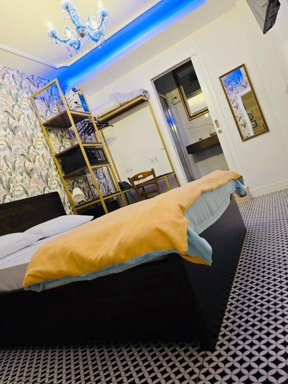 Postel nebo postele na pokoji v ubytování Luciano Valletta Boutique
