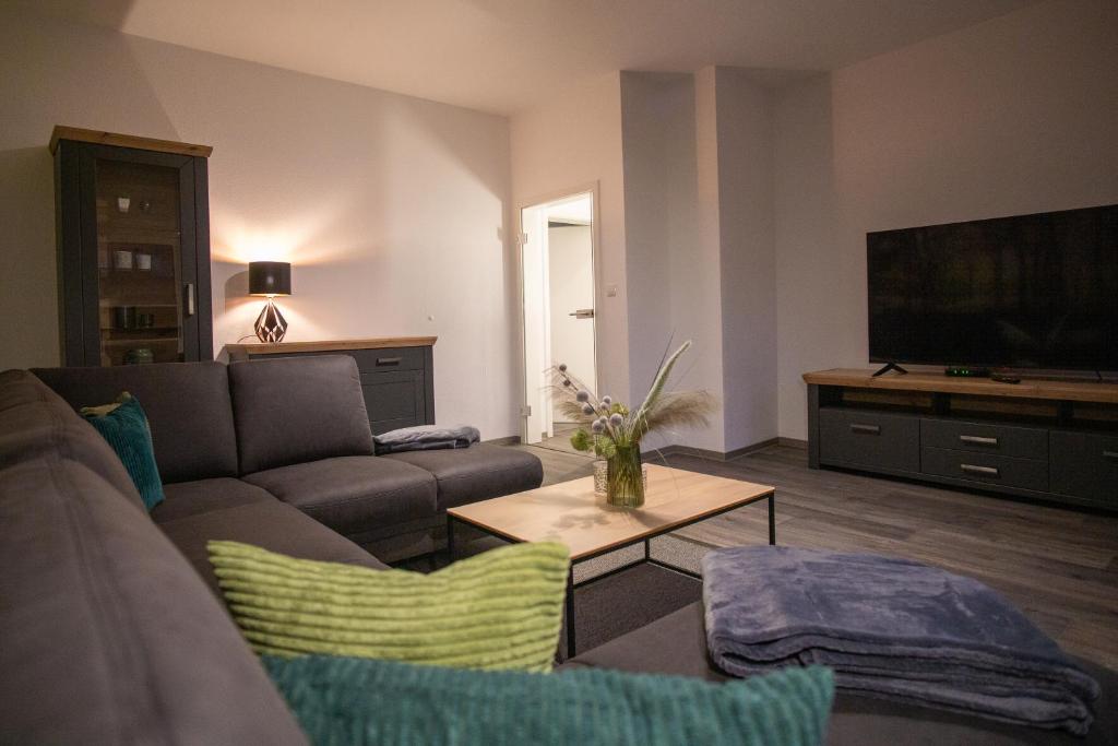 TV a/nebo společenská místnost v ubytování Ferienwohnung Busch 2