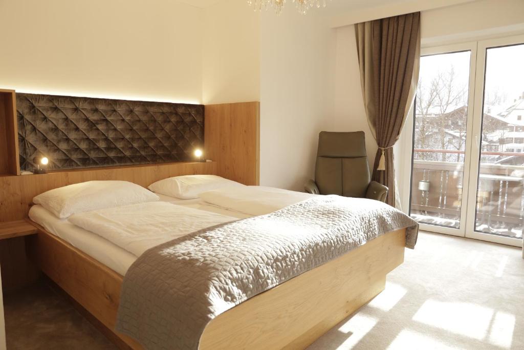 Postel nebo postele na pokoji v ubytování Thurners Boutique Hotel