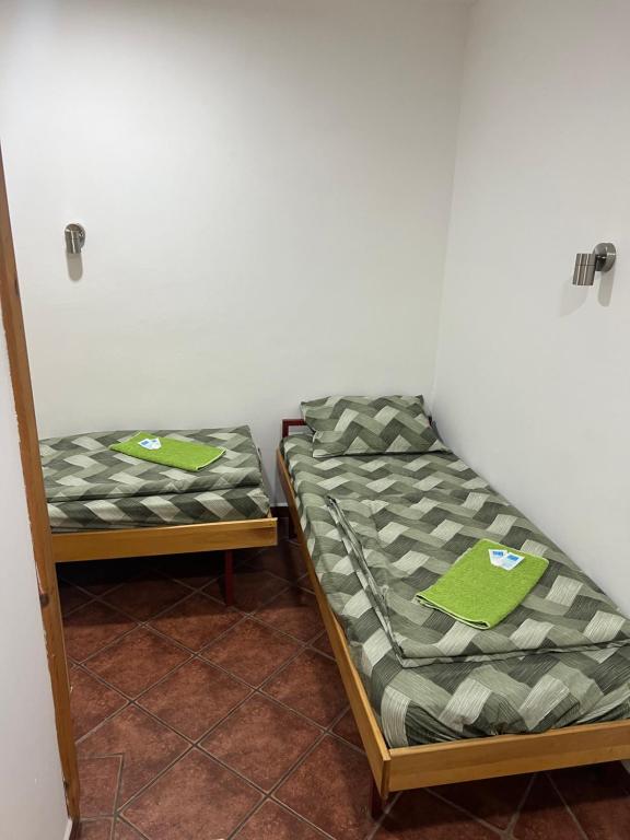 Postel nebo postele na pokoji v ubytování Nova Čubura