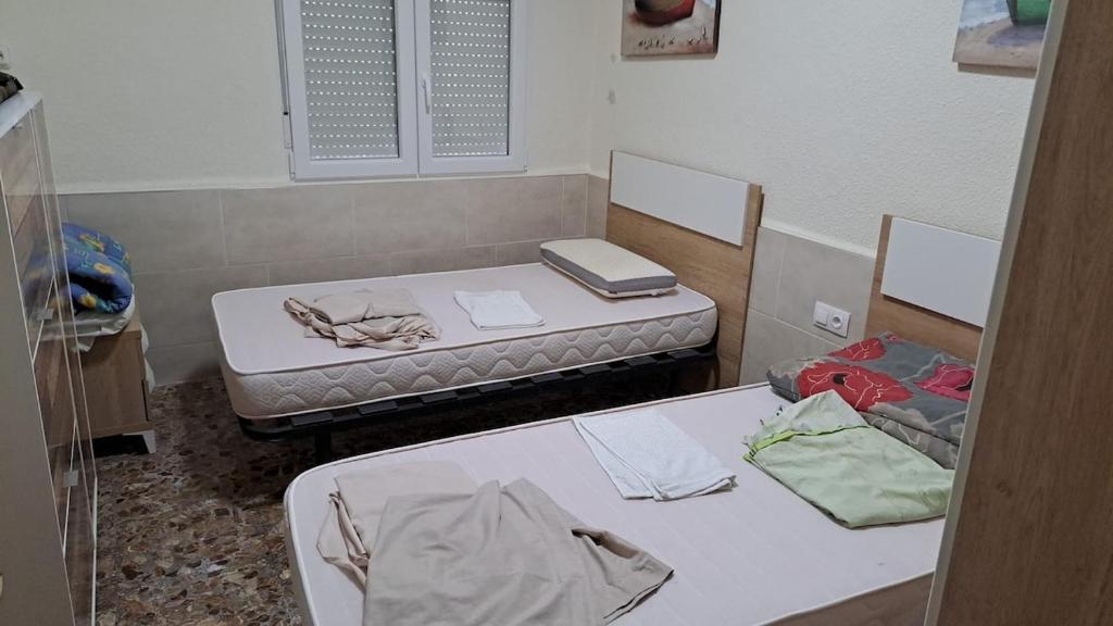 Ένα ή περισσότερα κρεβάτια σε δωμάτιο στο Villa with 4 Bedrooms and 2 Bathrooms and 1 Pool