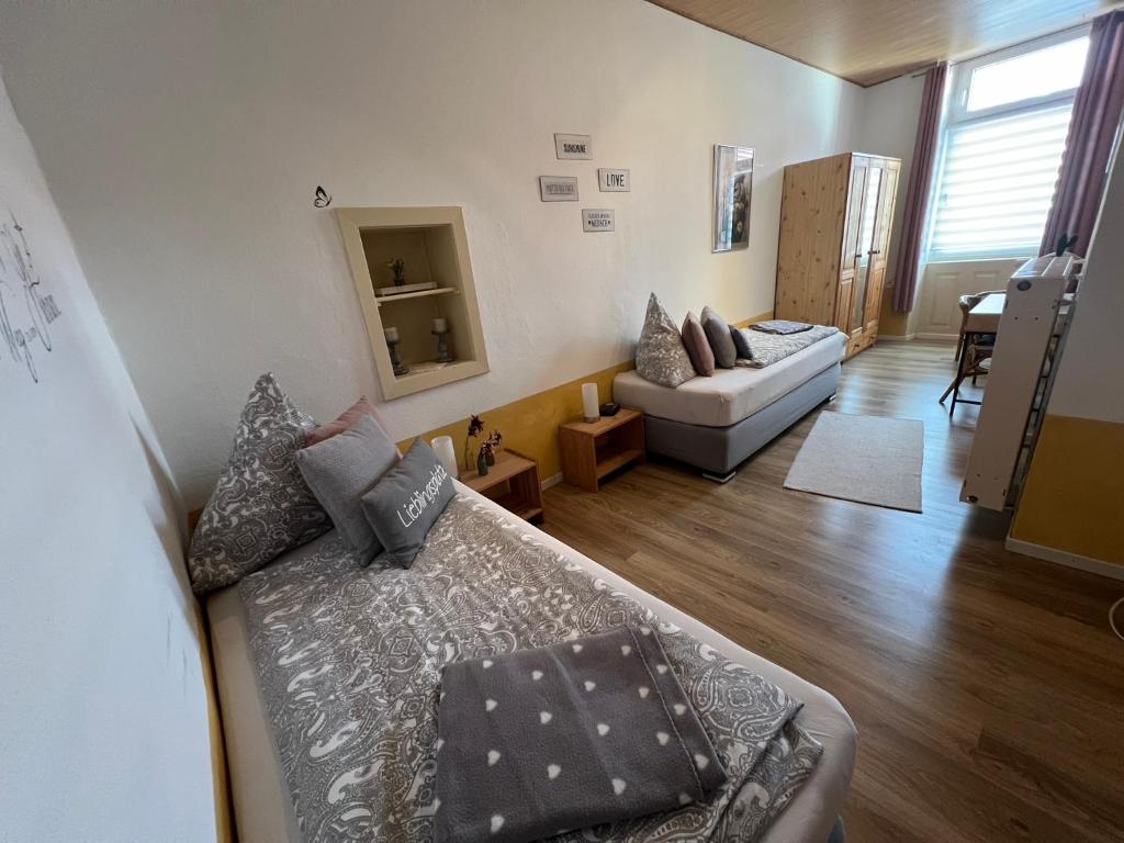 Postel nebo postele na pokoji v ubytování Ferienwohnung Vino Palatina