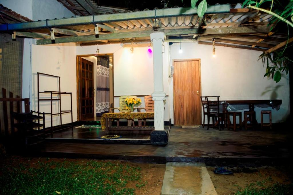 Patio nebo venkovní prostory v ubytování Thatched Villa