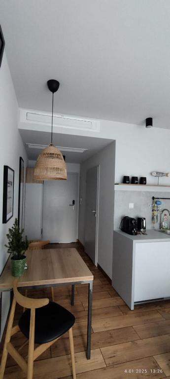 Kuchyň nebo kuchyňský kout v ubytování Magda Aparthotel Anchoria Mechelinki