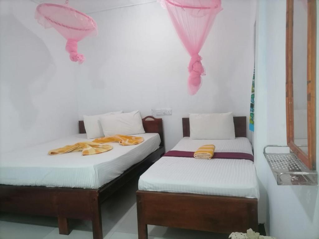 Postel nebo postele na pokoji v ubytování DA GREA NATURAL BEACH HOTEL