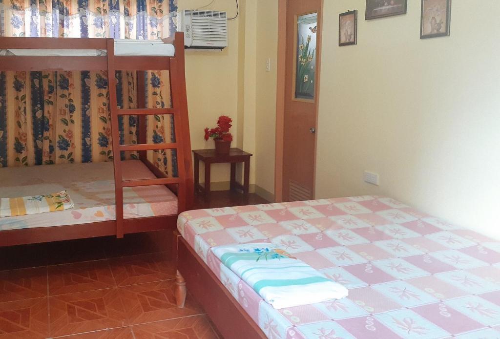 RedDoorz at Precious Dem Beach Resort Pagudpud - Habitación Familiar