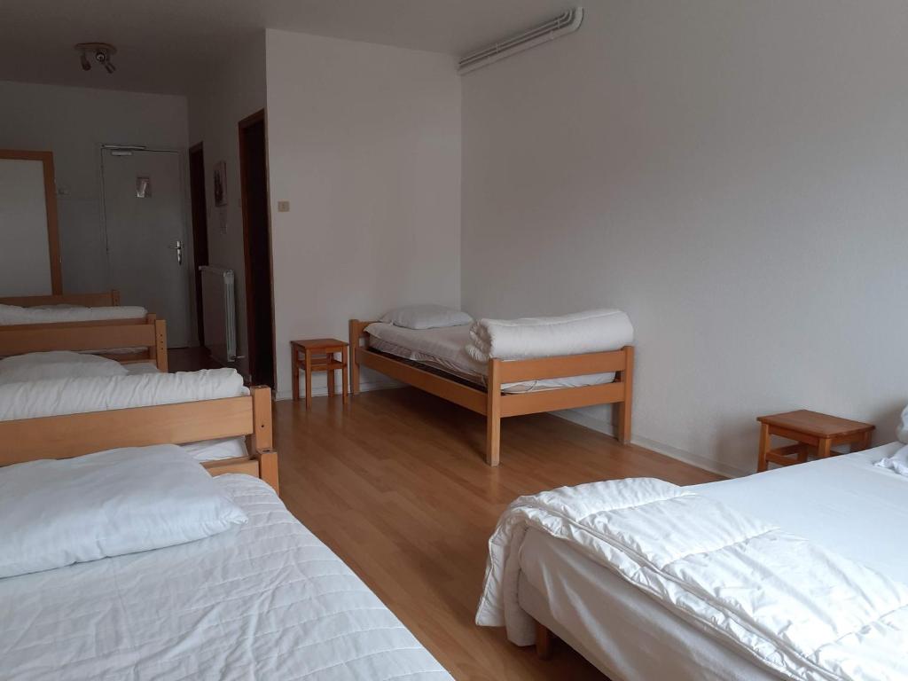 Postel nebo postele na pokoji v ubytování Gite de la Draye