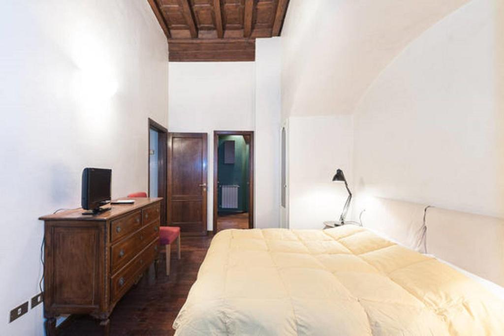 Posteľ alebo postele v izbe v ubytovaní Tornabuoni Apartment
