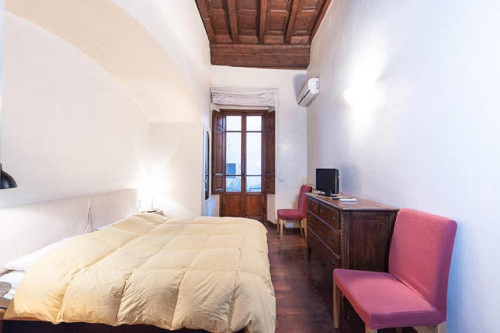 Posteľ alebo postele v izbe v ubytovaní Tornabuoni Apartment
