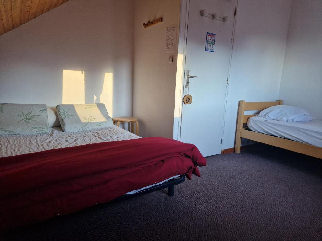 Postel nebo postele na pokoji v ubytování Gite de la Draye