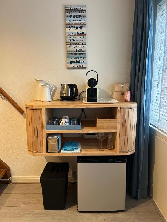 Kuchyň nebo kuchyňský kout v ubytování B&B Vloedlijn Texel
