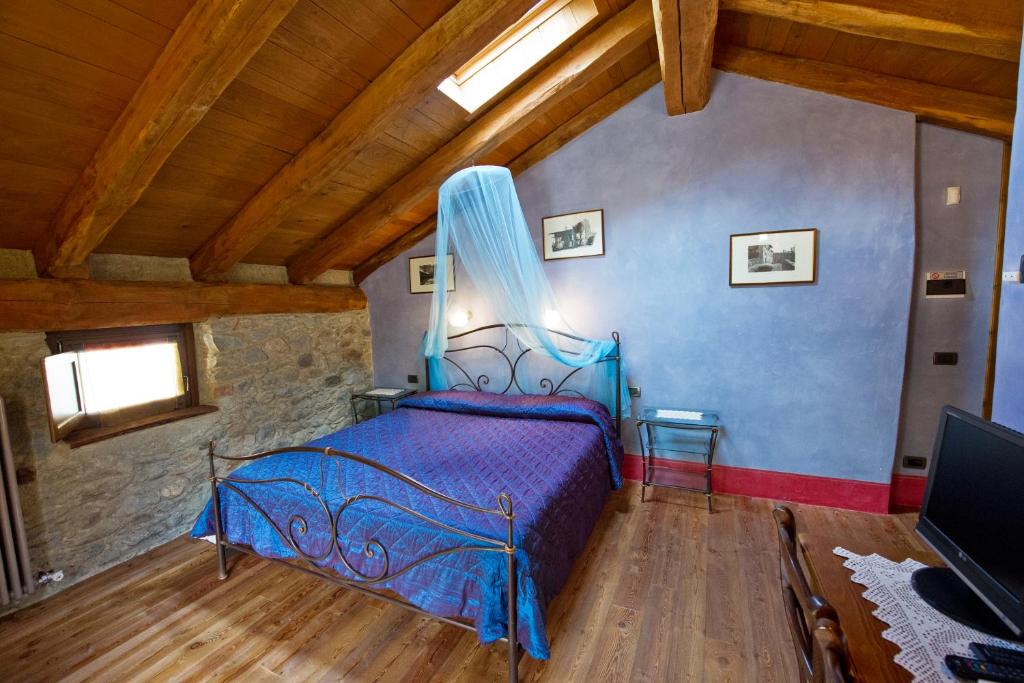 Postel nebo postele na pokoji v ubytování La Maison Des Vignerons Chambres D'Hotes B&B