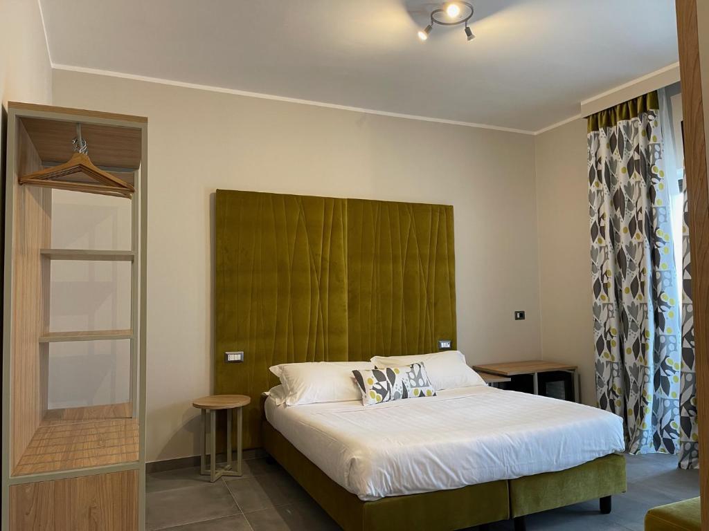 Postel nebo postele na pokoji v ubytování Hotel Sant'Elia