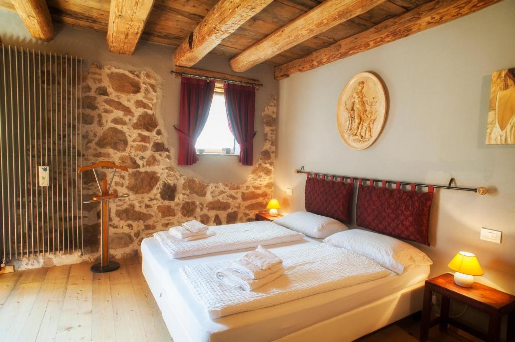 Postel nebo postele na pokoji v ubytování Maso Franceschella