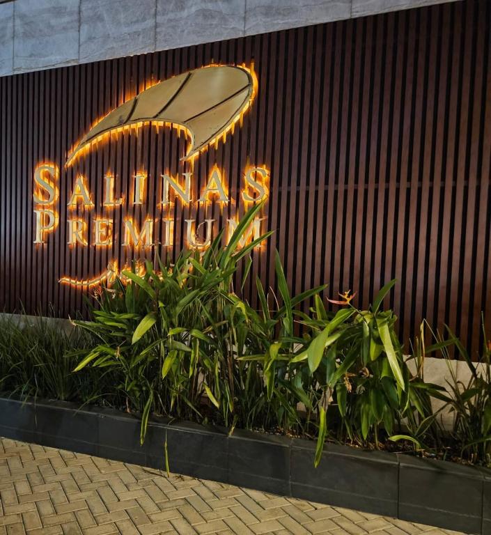 a sign for a santa cruz sign on a building at Apto Salinas Premium - 2 quartos - 1 suíte in Salinópolis