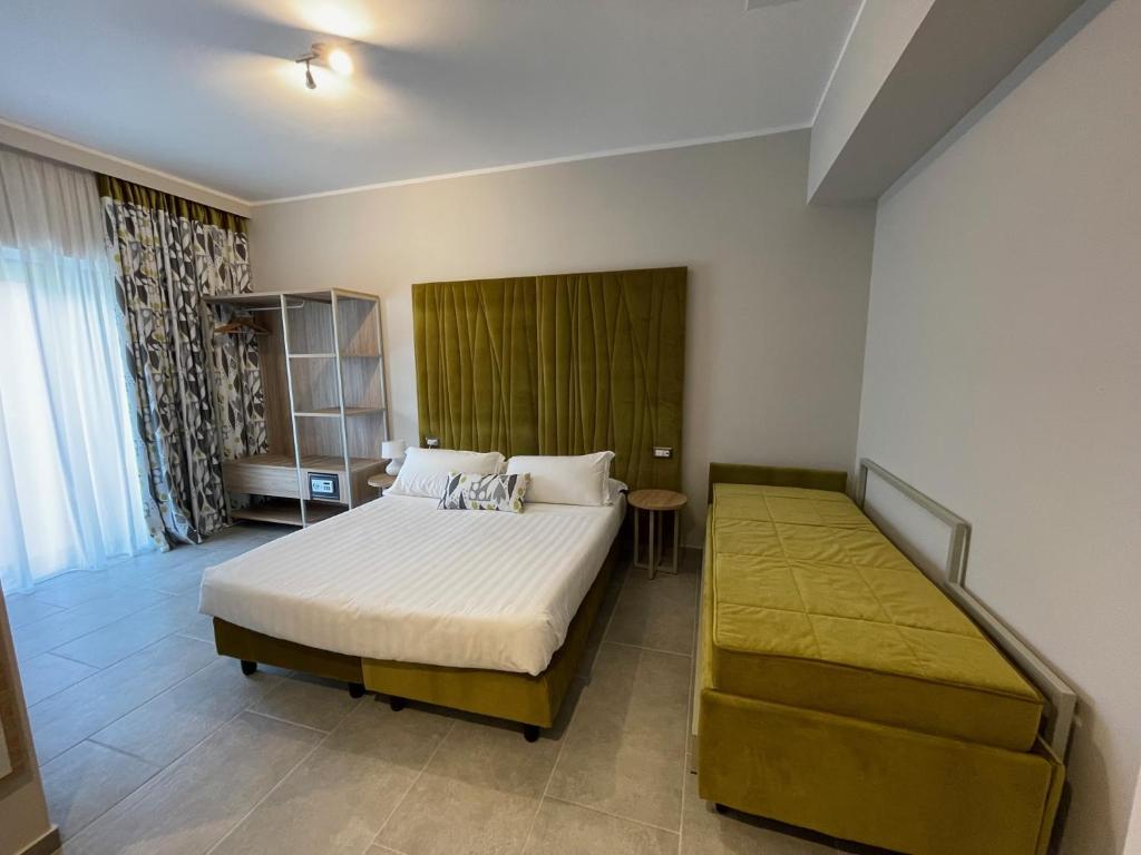 Postel nebo postele na pokoji v ubytování Hotel Sant'Elia