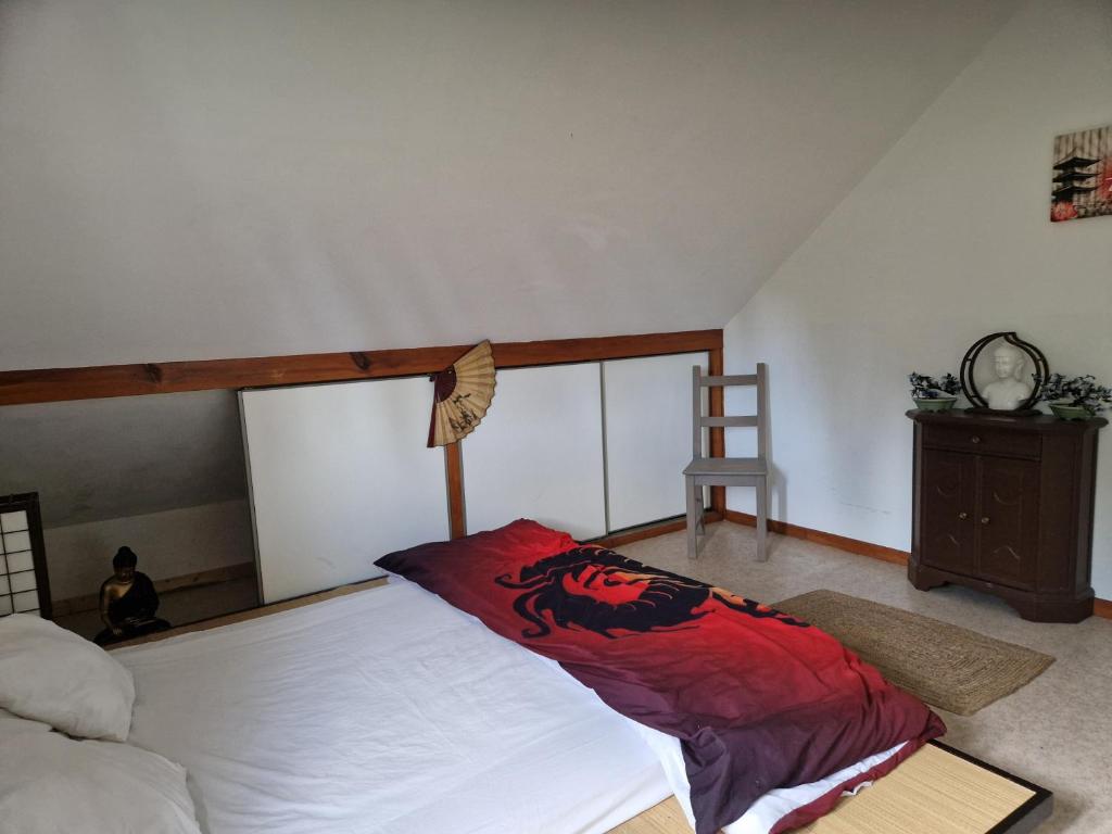 Postel nebo postele na pokoji v ubytování Gite de la Draye