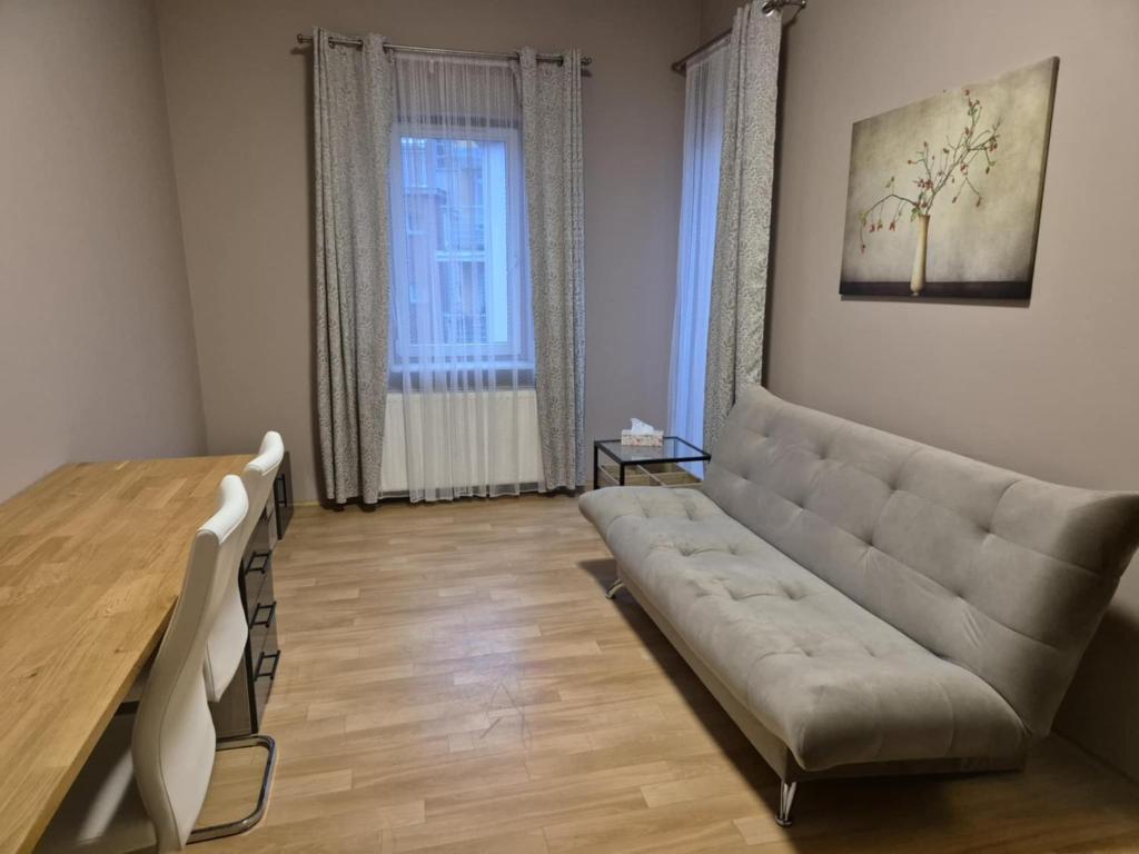 Posezení v ubytování Przytulna kawalerka w Centrum Poznania