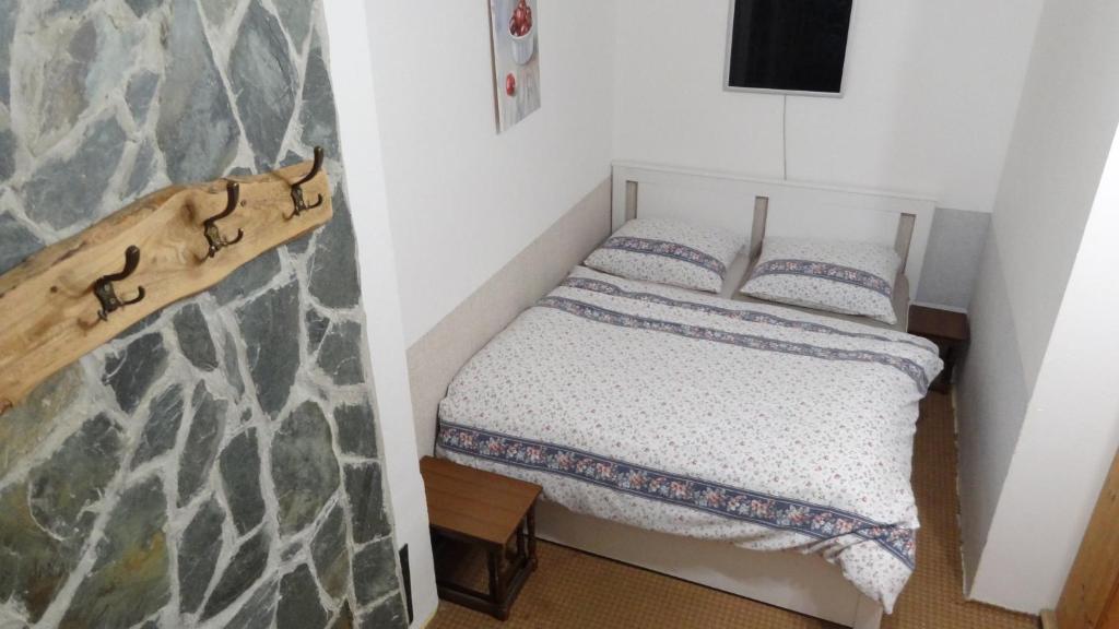 Postel nebo postele na pokoji v ubytování Statek Polánka