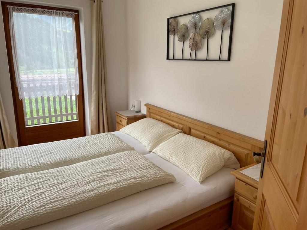Postel nebo postele na pokoji v ubytování Brunnerhof