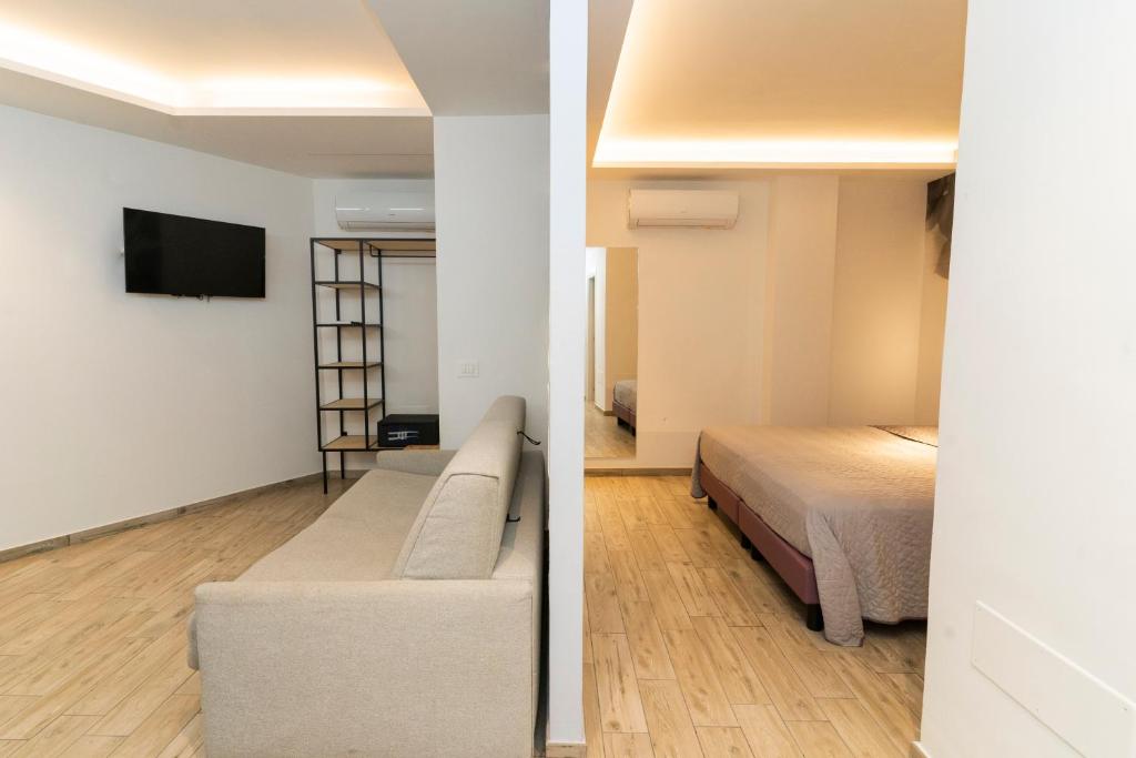 Postel nebo postele na pokoji v ubytování Vesuvio Inn Bed & Wine Experience