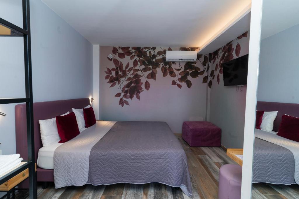 Postel nebo postele na pokoji v ubytování Vesuvio Inn Bed & Wine Experience