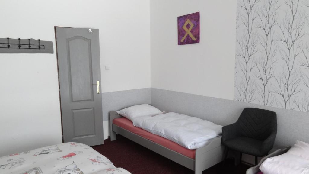 Postel nebo postele na pokoji v ubytování Statek Polánka