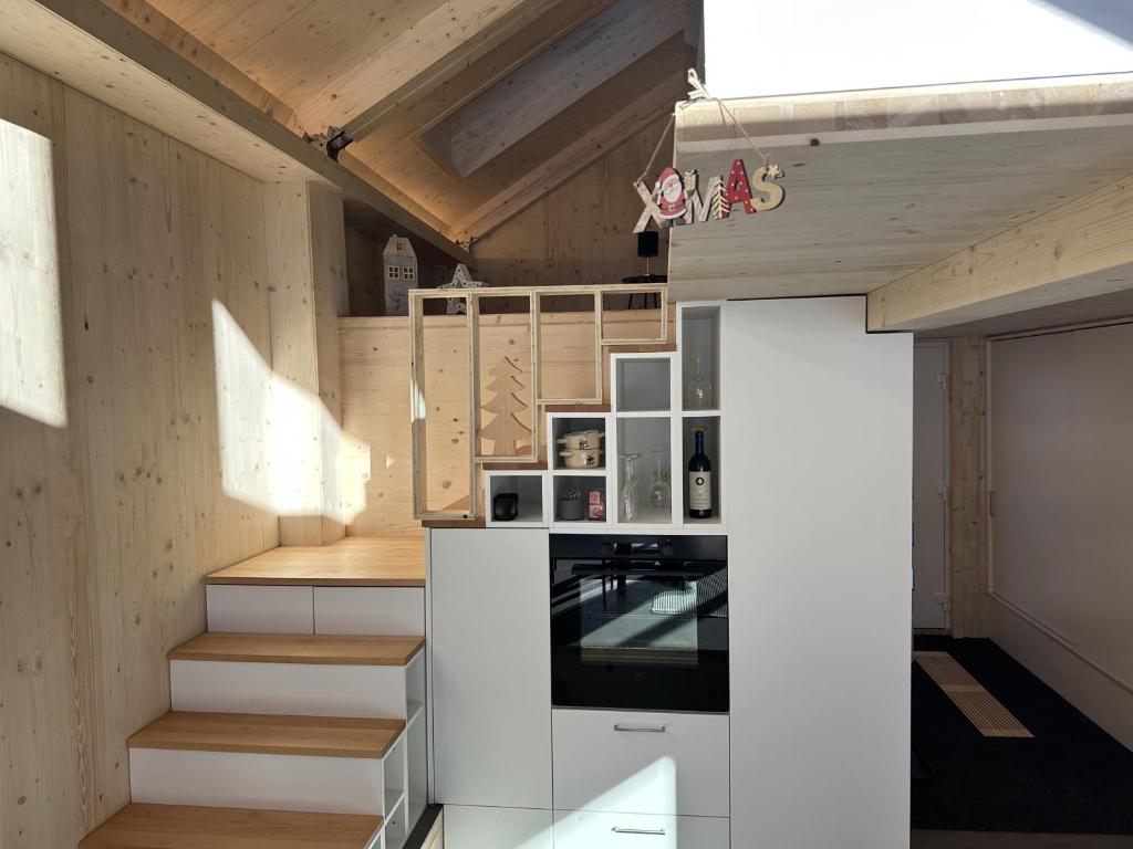 Kuchyň nebo kuchyňský kout v ubytování Tiny Sera mit privatem Whirlpool