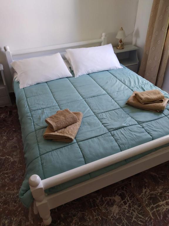 Posteľ alebo postele v izbe v ubytovaní Vaggelis Traditional House