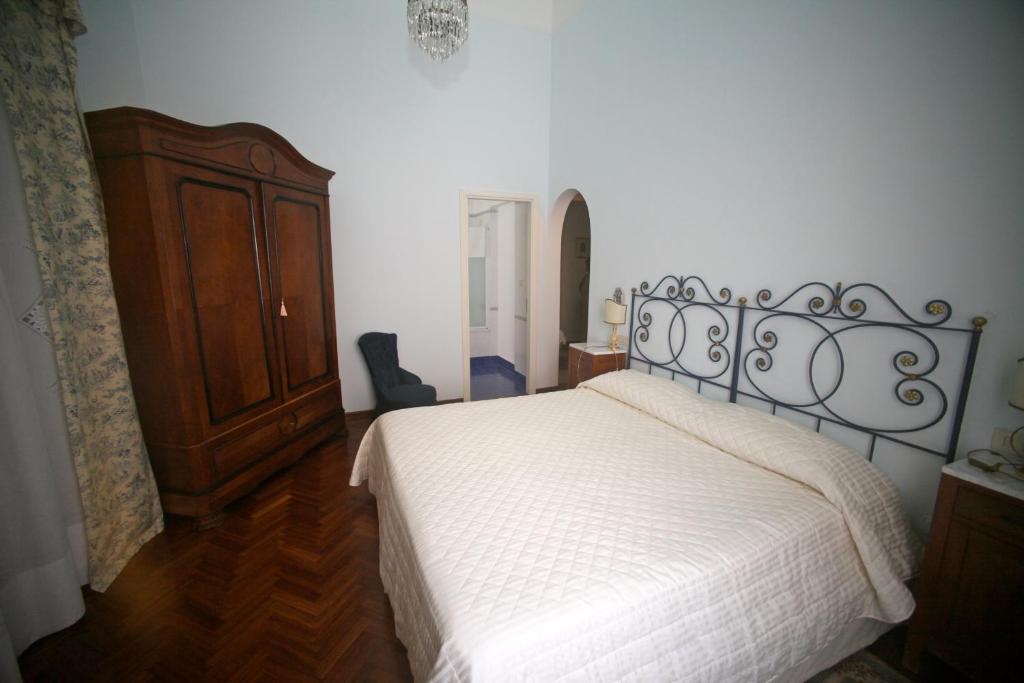 Postel nebo postele na pokoji v ubytování Villa L'Aurora