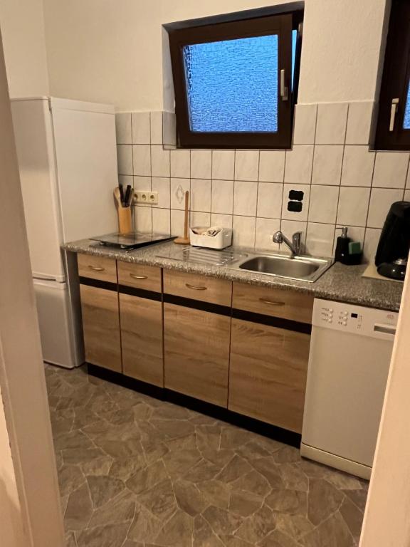 Kuchyň nebo kuchyňský kout v ubytování Ferienwohnung Schwetzingen
