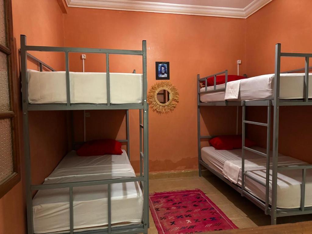 Postel nebo postele na pokoji v ubytování Riad dar Malak