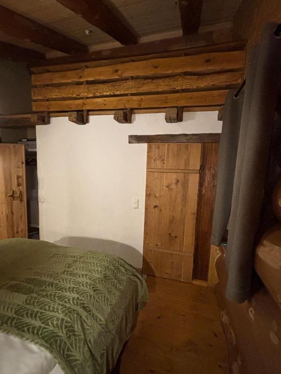 Postel nebo postele na pokoji v ubytování Chalet Vogelkirsche
