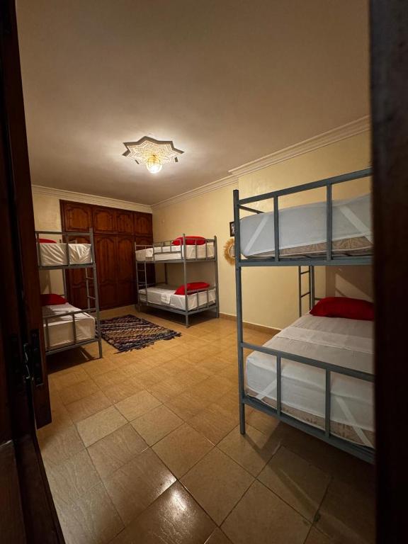 Postel nebo postele na pokoji v ubytování Riad dar Malak