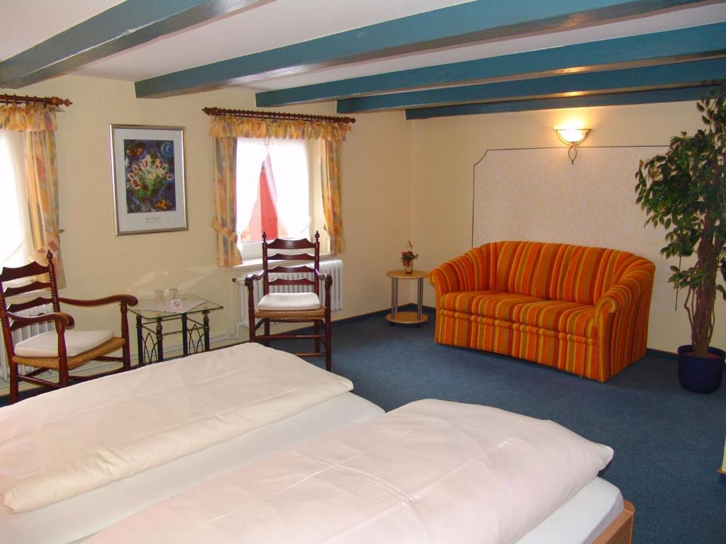 Postel nebo postele na pokoji v ubytování Hotel Schatthaus