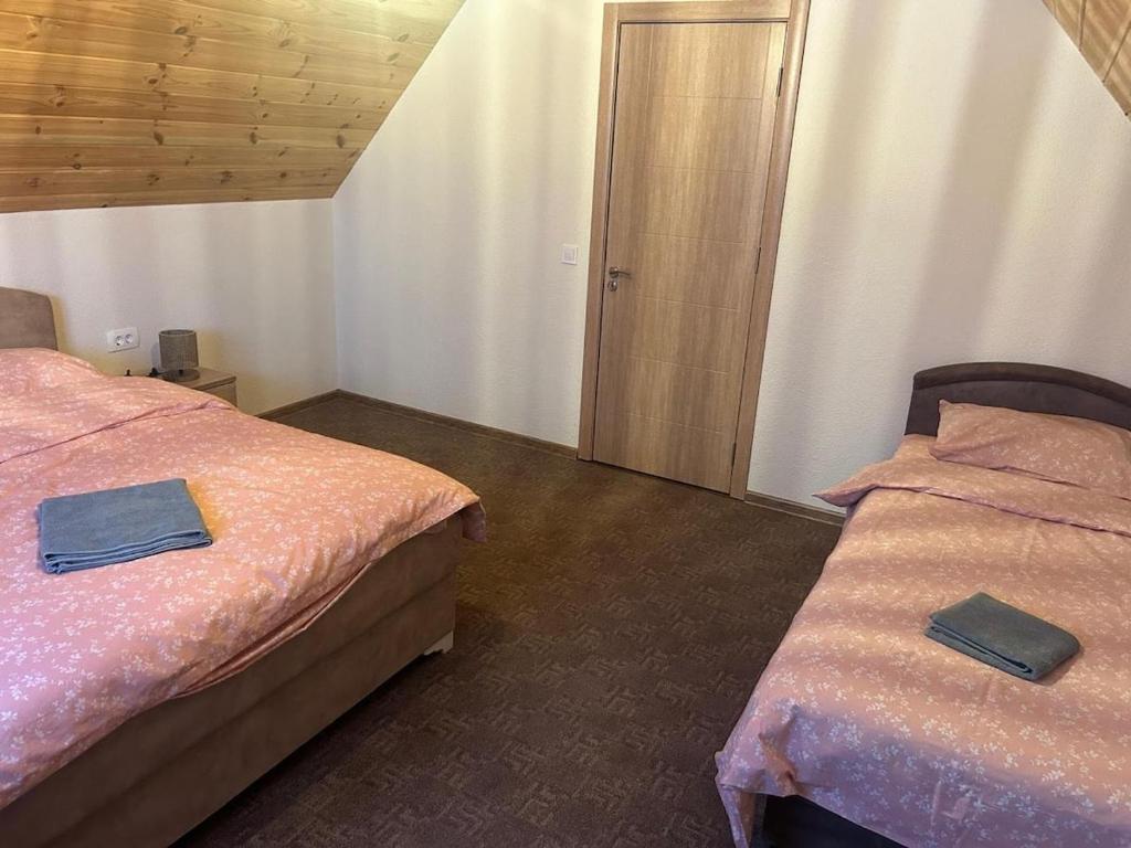 Postel nebo postele na pokoji v ubytování Apartment Bašović