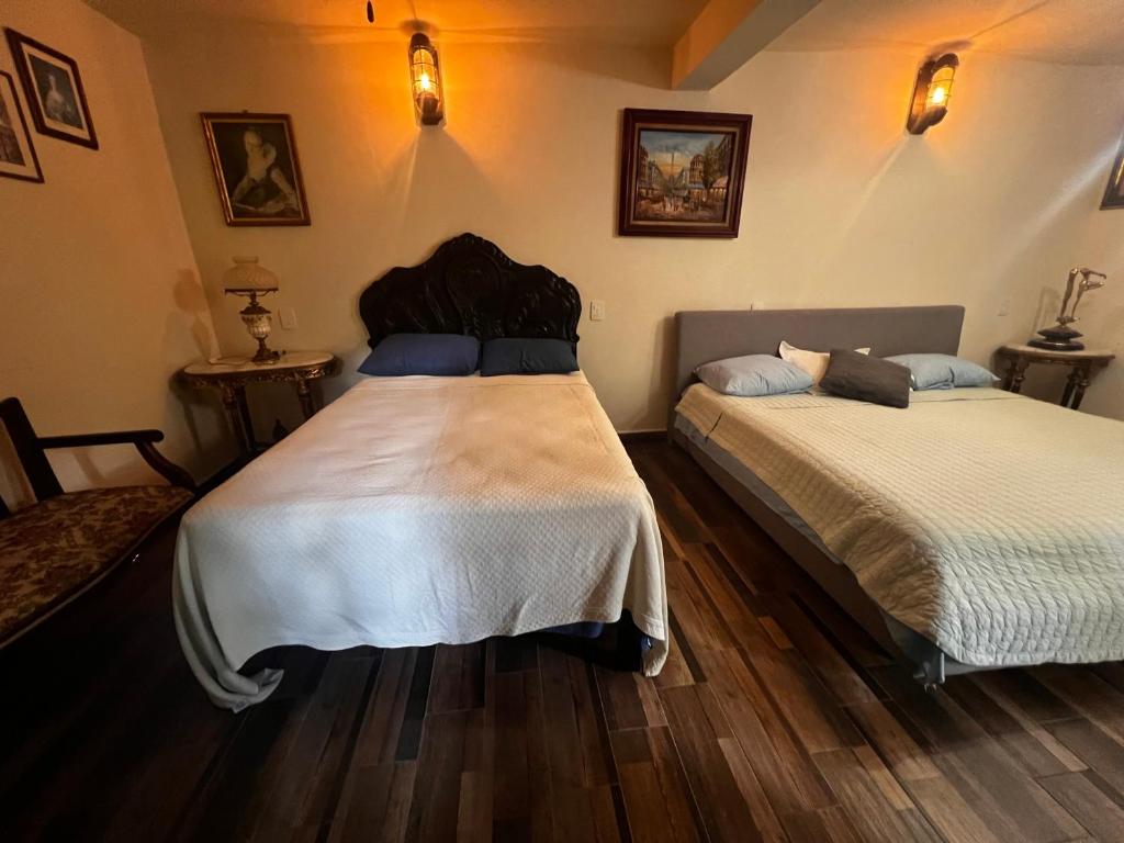 Postel nebo postele na pokoji v ubytování Hotel River Blue