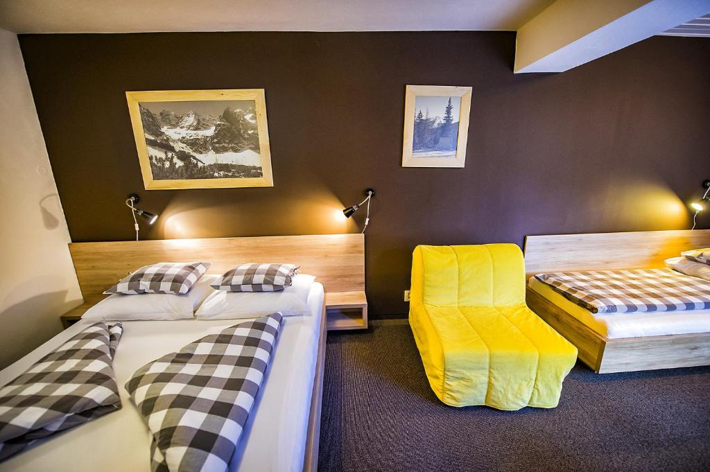 Letto o letti in una camera di Penzion Flores