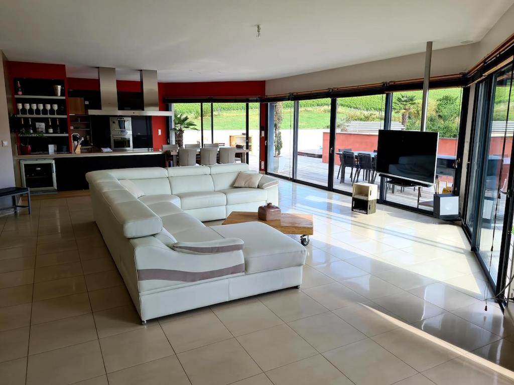 TV a/nebo společenská místnost v ubytování Loft avec Vue