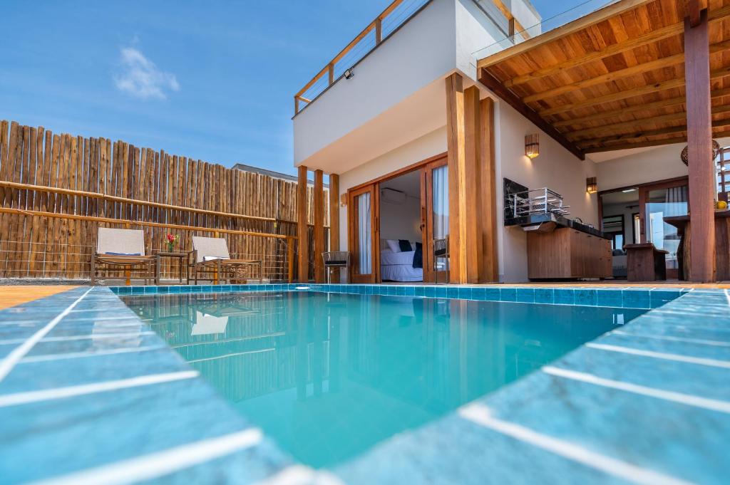 an image of a swimming pool in a house at Bahia Soul - Casa Ayla - Barra Grande - Península de Maraú in Marau