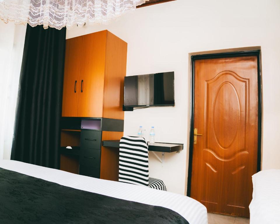 TV a/nebo společenská místnost v ubytování One Click Apartment