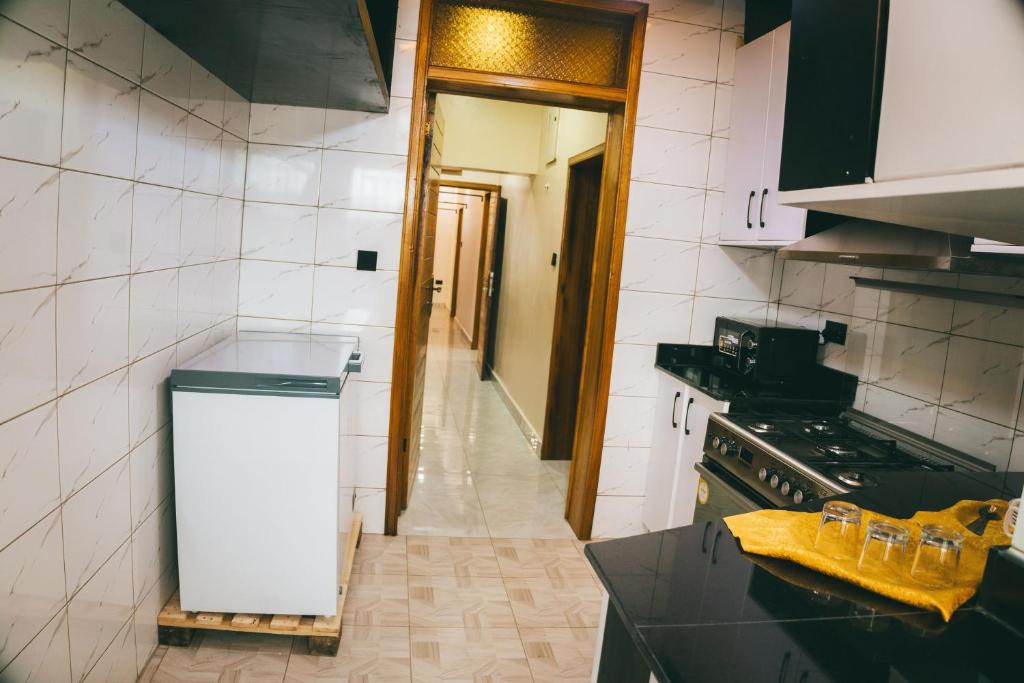 Kuchyň nebo kuchyňský kout v ubytování One Click Apartment