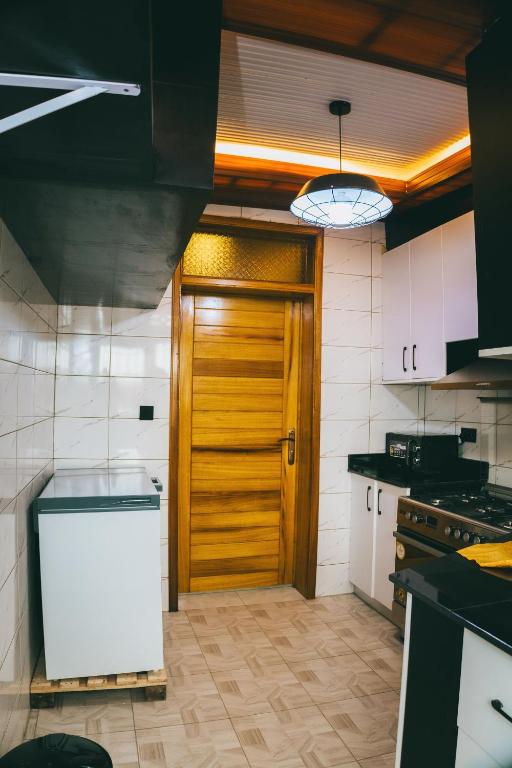 Kuchyň nebo kuchyňský kout v ubytování One Click Apartment