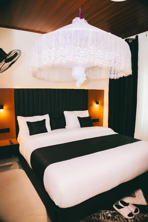 Postel nebo postele na pokoji v ubytování One Click Apartment