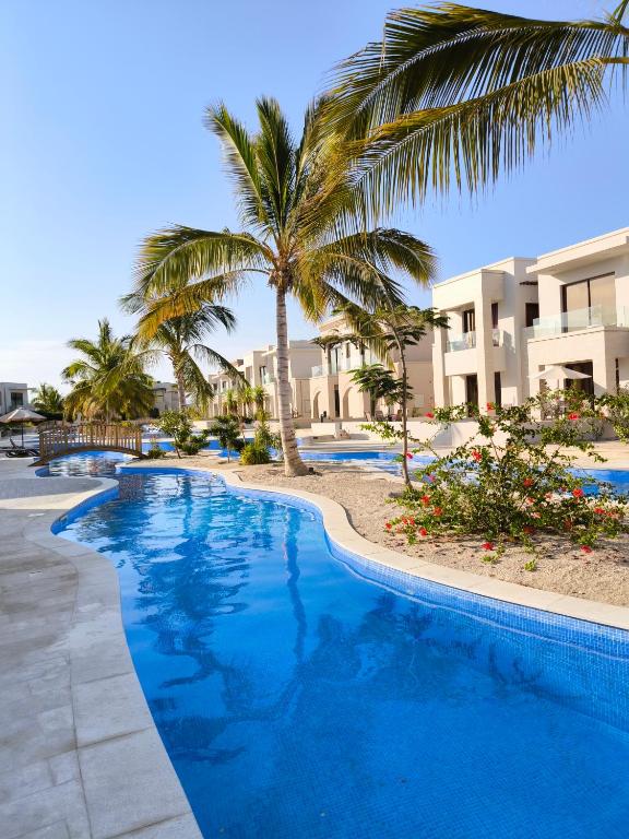 Bazén v ubytování Laguna Apartment HAWANA SALALAH Resort nebo v jeho okolí