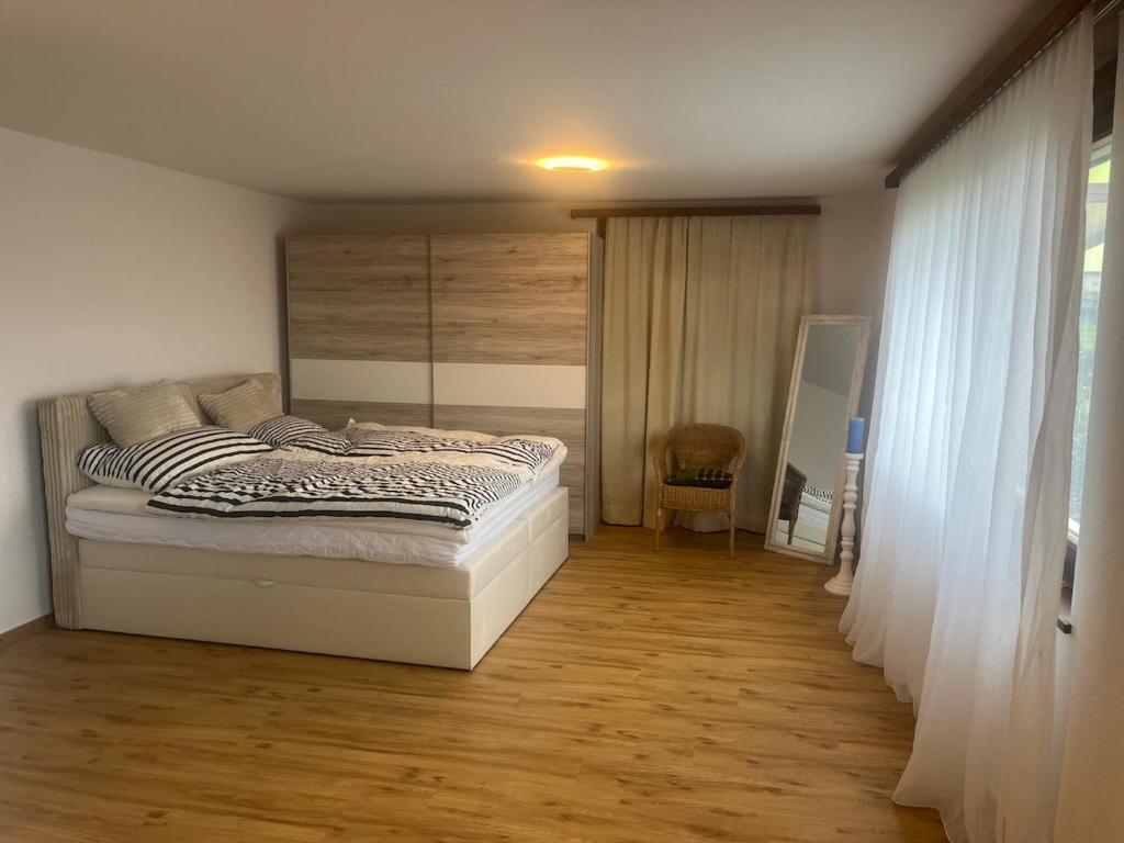 Postel nebo postele na pokoji v ubytování Studio 5 Minuten von Murten