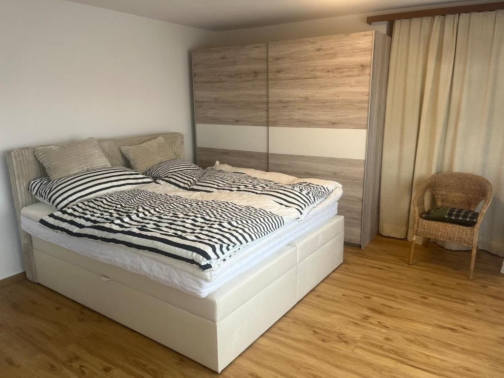 Postel nebo postele na pokoji v ubytování Studio 5 Minuten von Murten