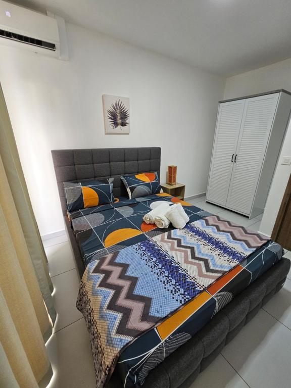 Postel nebo postele na pokoji v ubytování Villa Azure Flic-en-Flac 5 min de la plage