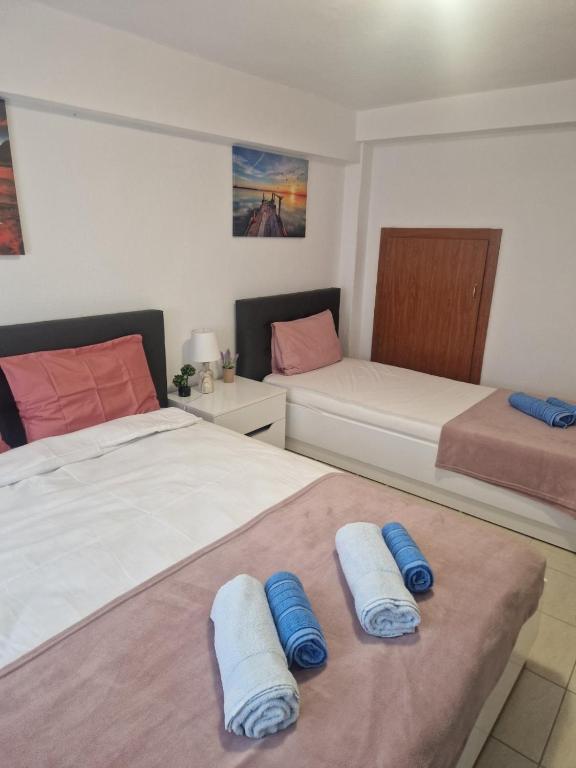 Postel nebo postele na pokoji v ubytování Pamys House